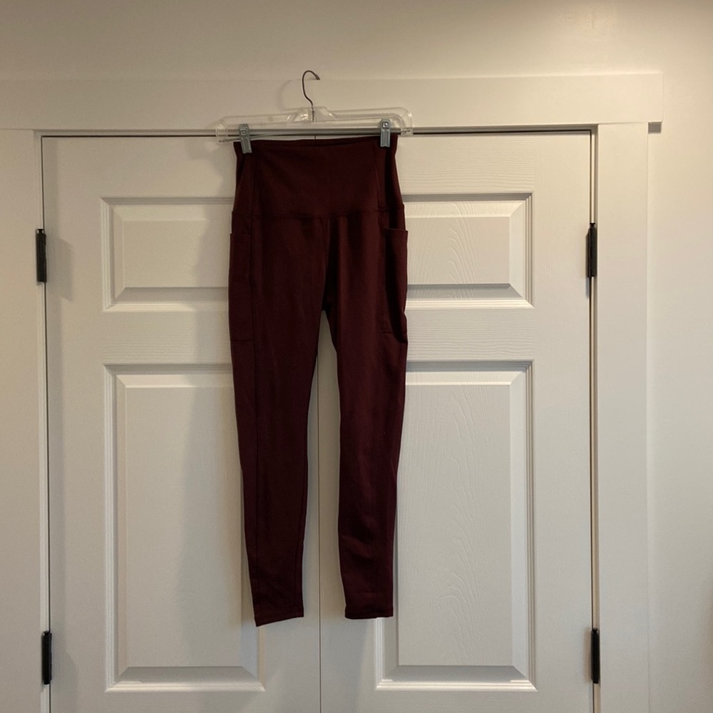 Danskin yoga leggings size small in a maroon purple ish color.
